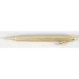 An S Mordan & Co 9ct gold cased propelling pencil.