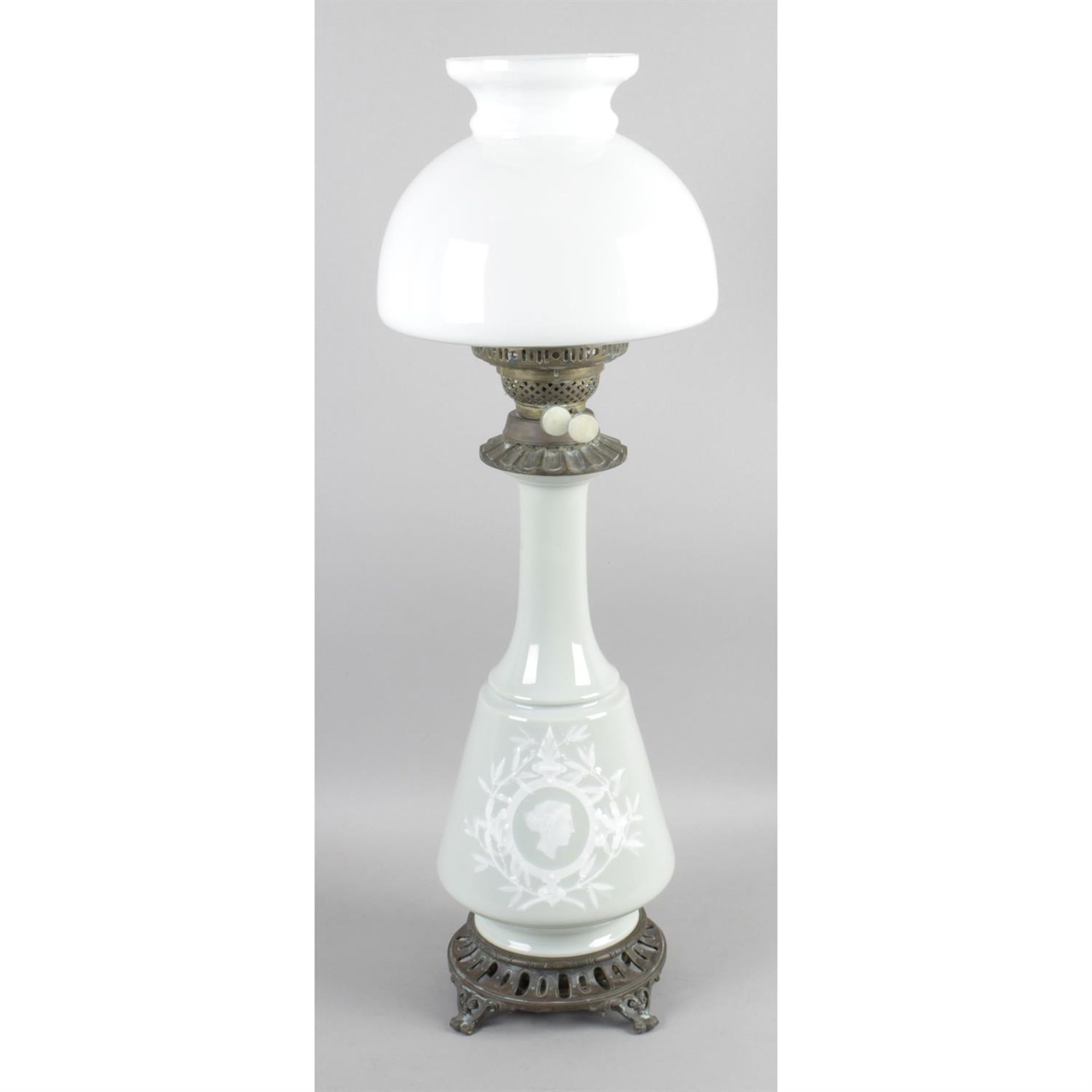 A Victorian oil lamp.