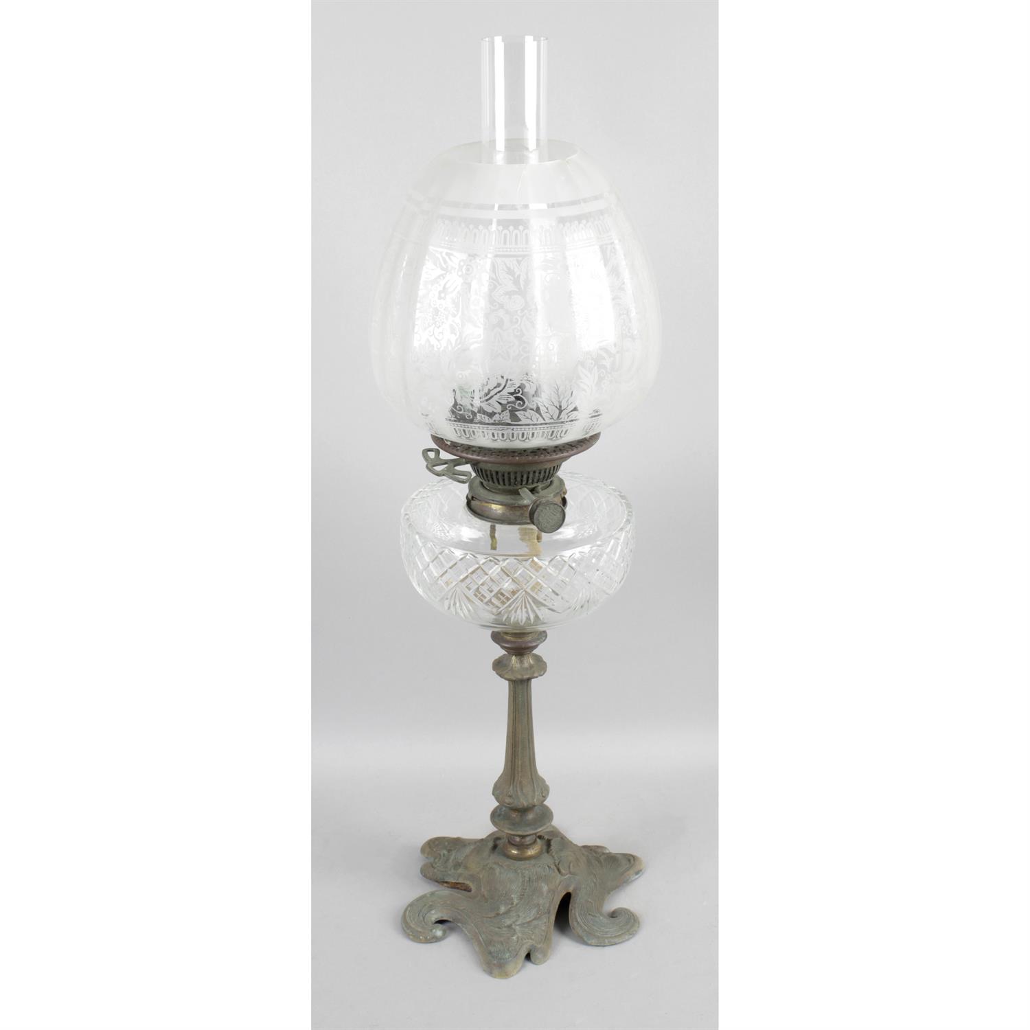 A Victorian oil lamp.