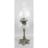 A Victorian oil lamp.