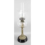 A Victorian oil lamp.