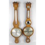 A 19th century mahogany veneered wall hanging 'banjo' cased barometer, together with similar