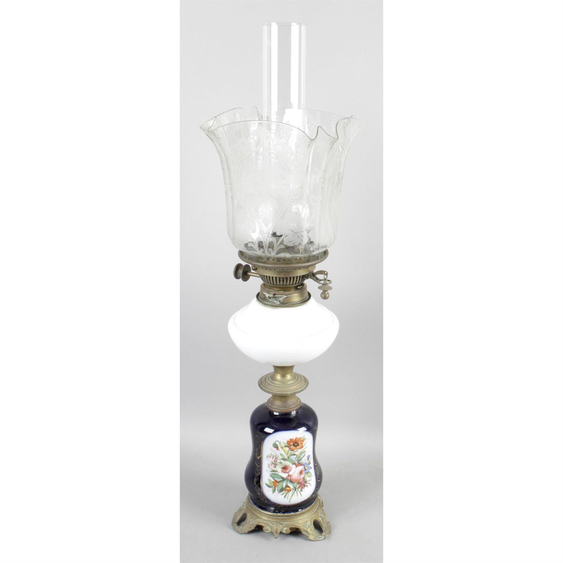 A Victorian oil lamp.