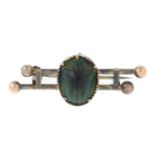 An early 20th century gold scarab bar brooch.