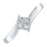 An 18ct gold square-shape diamond crossover ring.