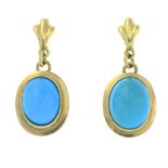 A pair of turquoise drop earring.