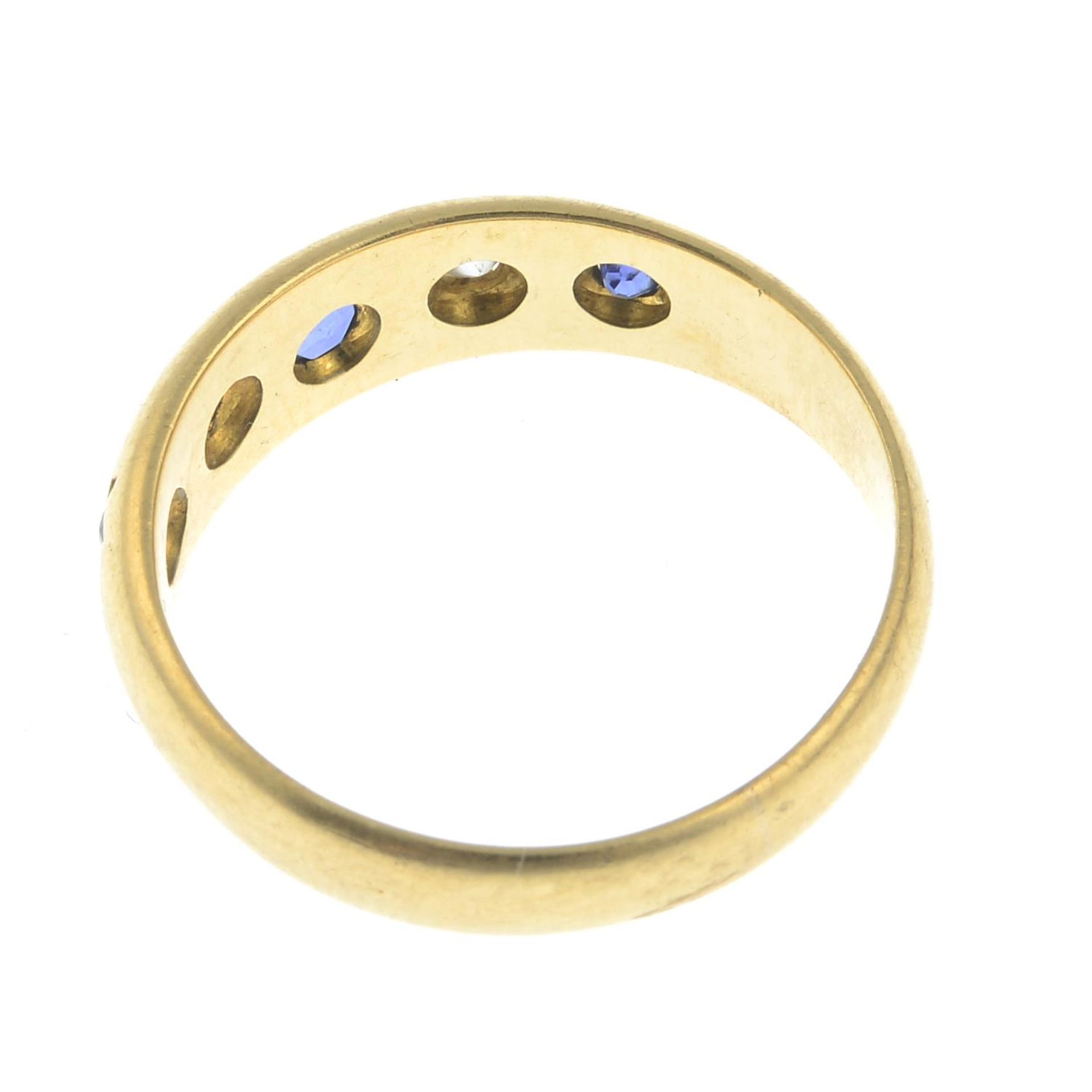 An Edwardian 18ct gold star-set sapphire and old-cut diamond band ring. - Bild 2 aus 2