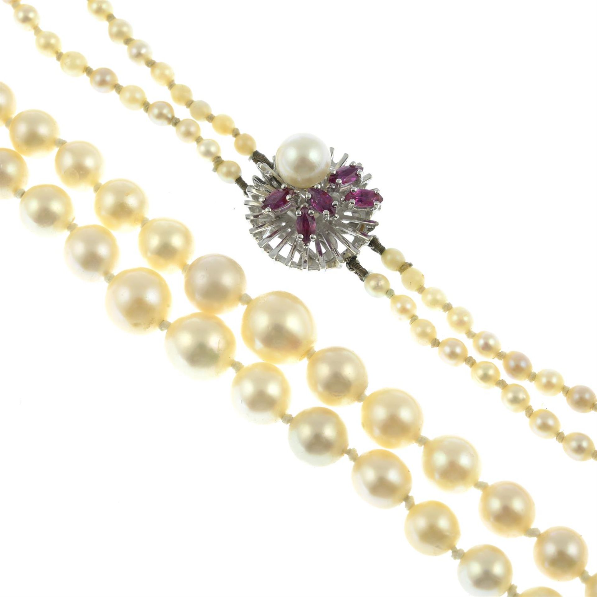 A mid 20th century cultured pearl two strand necklace, with 14ct gold ruby and cultured pearl clasp.