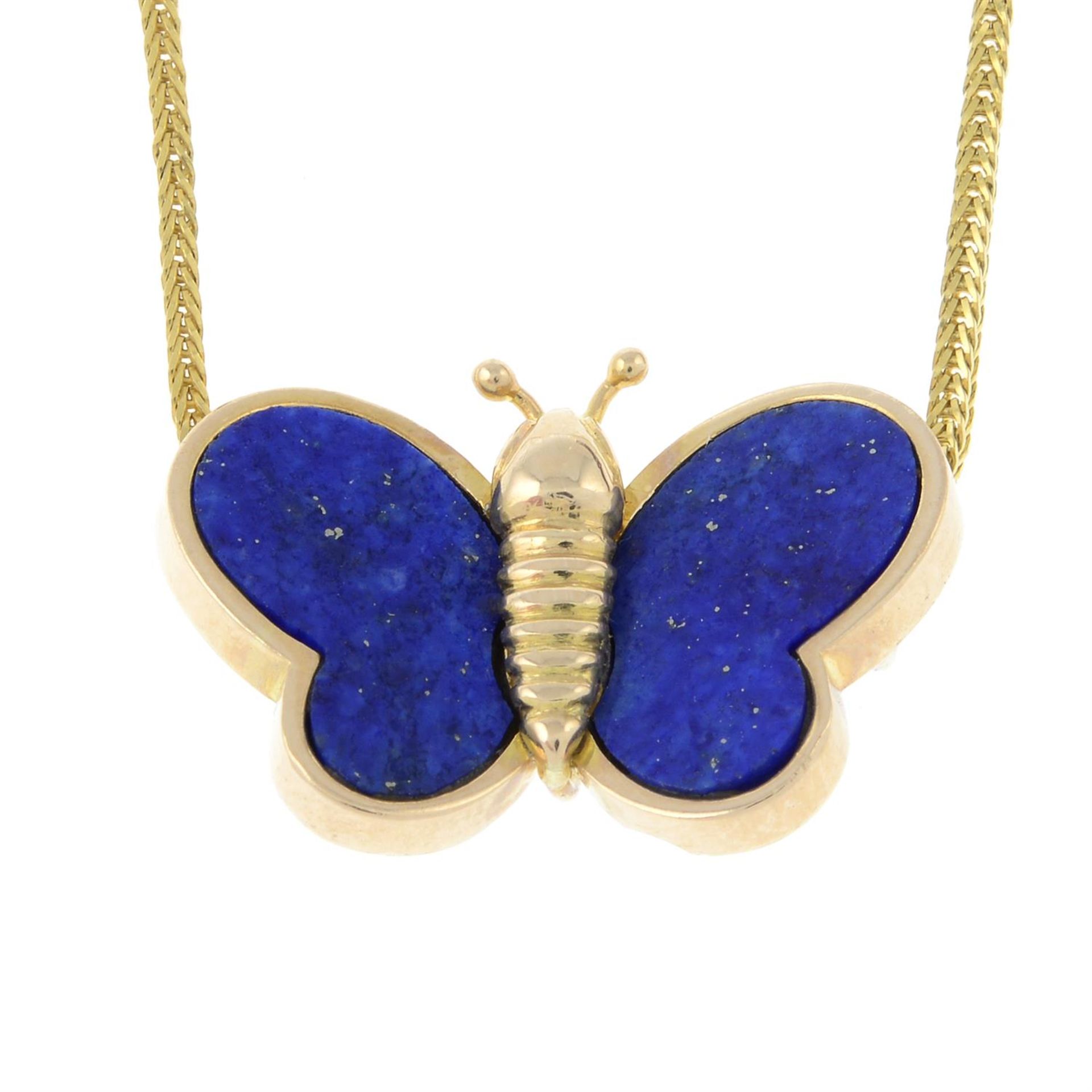 A lapis lazuli inlay butterfly, on rope-link chain.