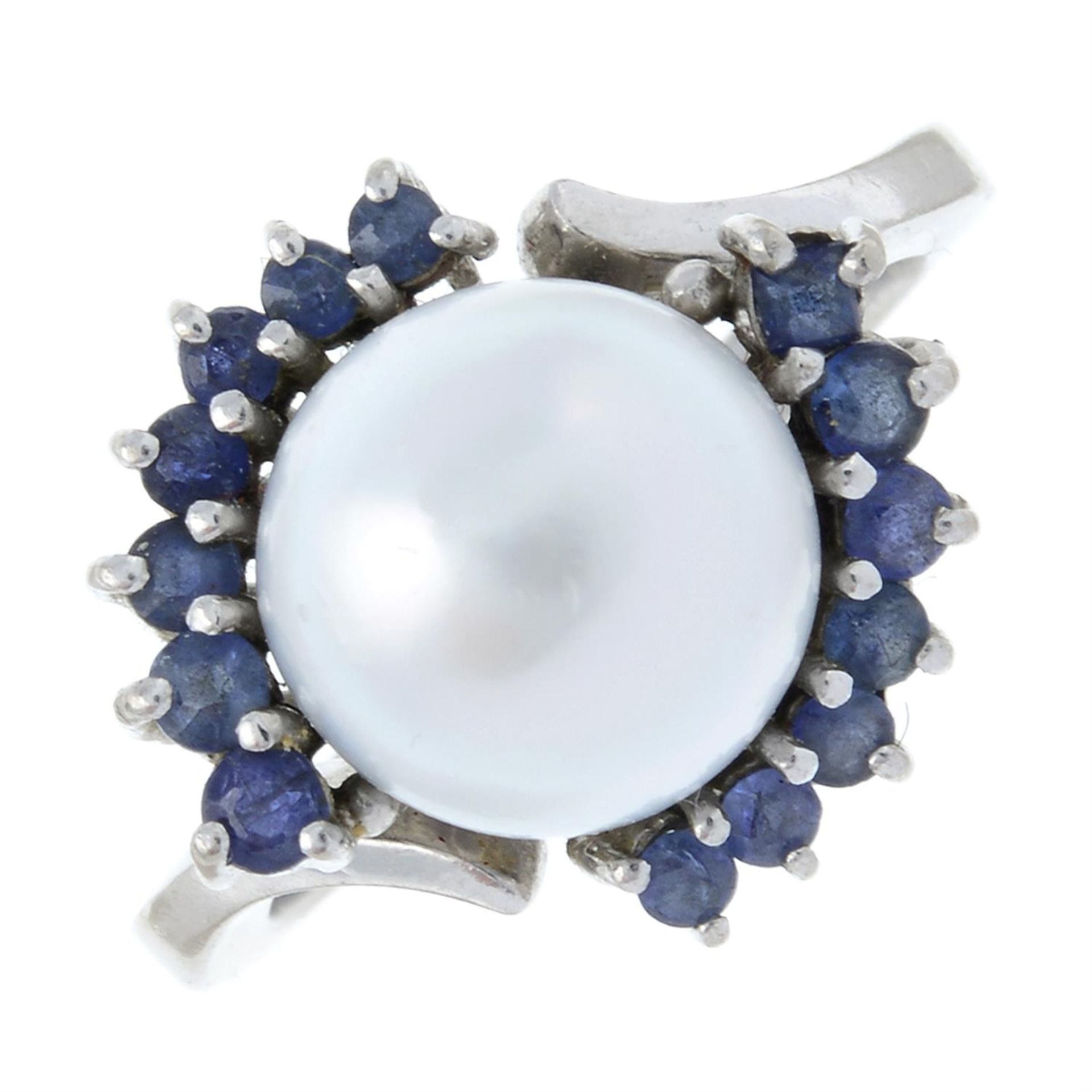 A cultured pearl and sapphire dress ring.