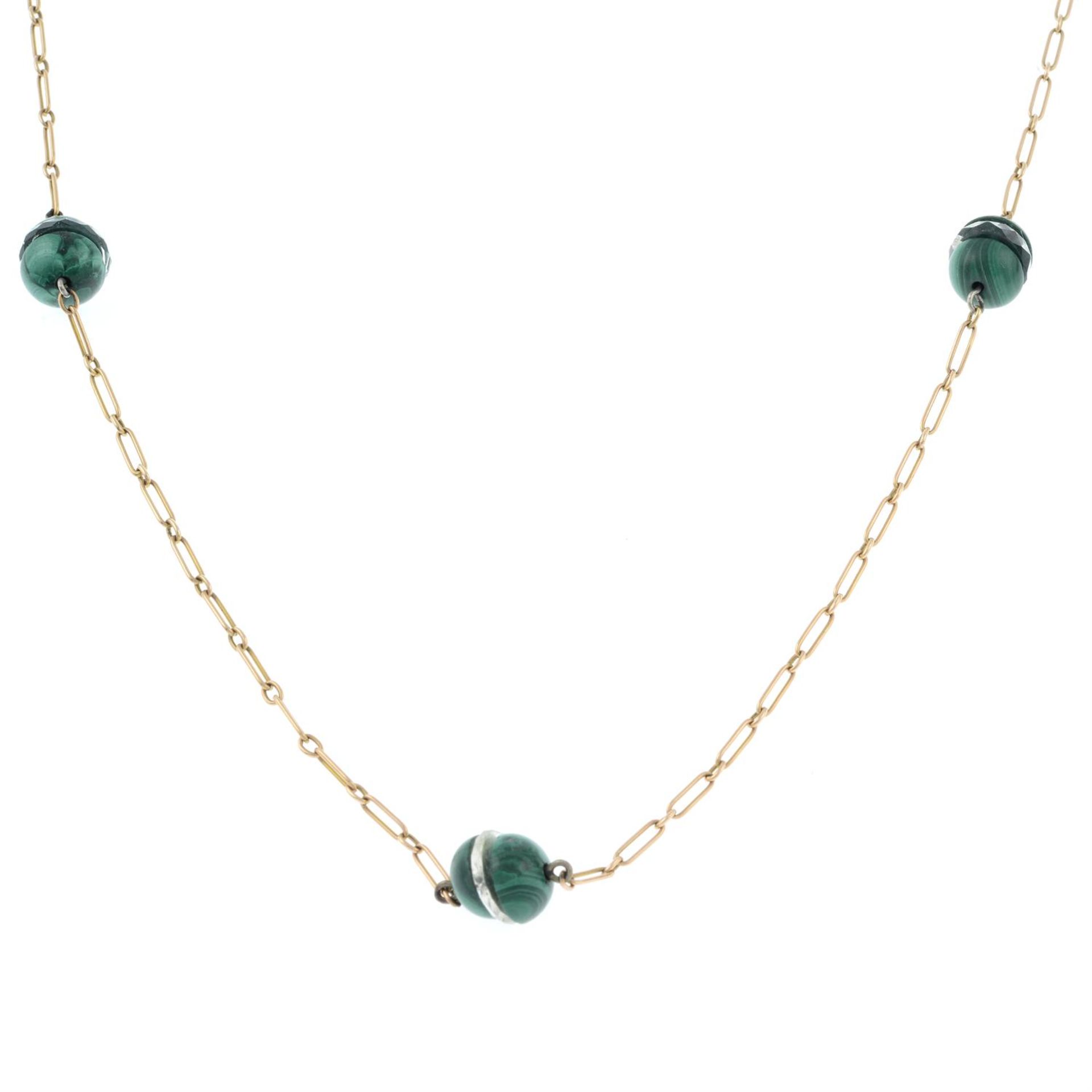 An early 20th century gold malachite and rock quartz necklace.