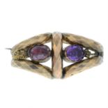A late 19th century gold foil-back amethyst textured brooch.