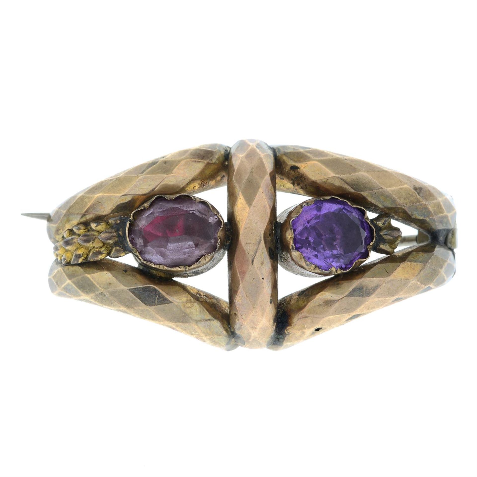 A late 19th century gold foil-back amethyst textured brooch.