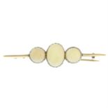 A mid 20th century 9ct gold opal cabochon brooch.