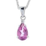 A pink sapphire and diamond pendant with chain.