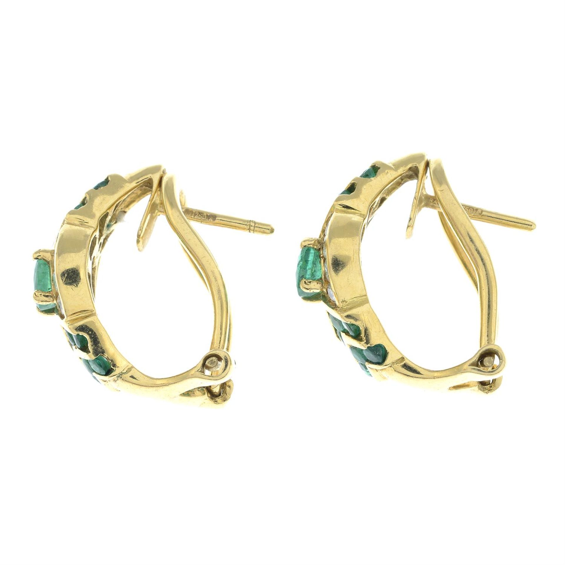 A pair of 18ct gold round-shape emerald and brilliant-cut diamond hinge-back stud earrings. - Image 2 of 2