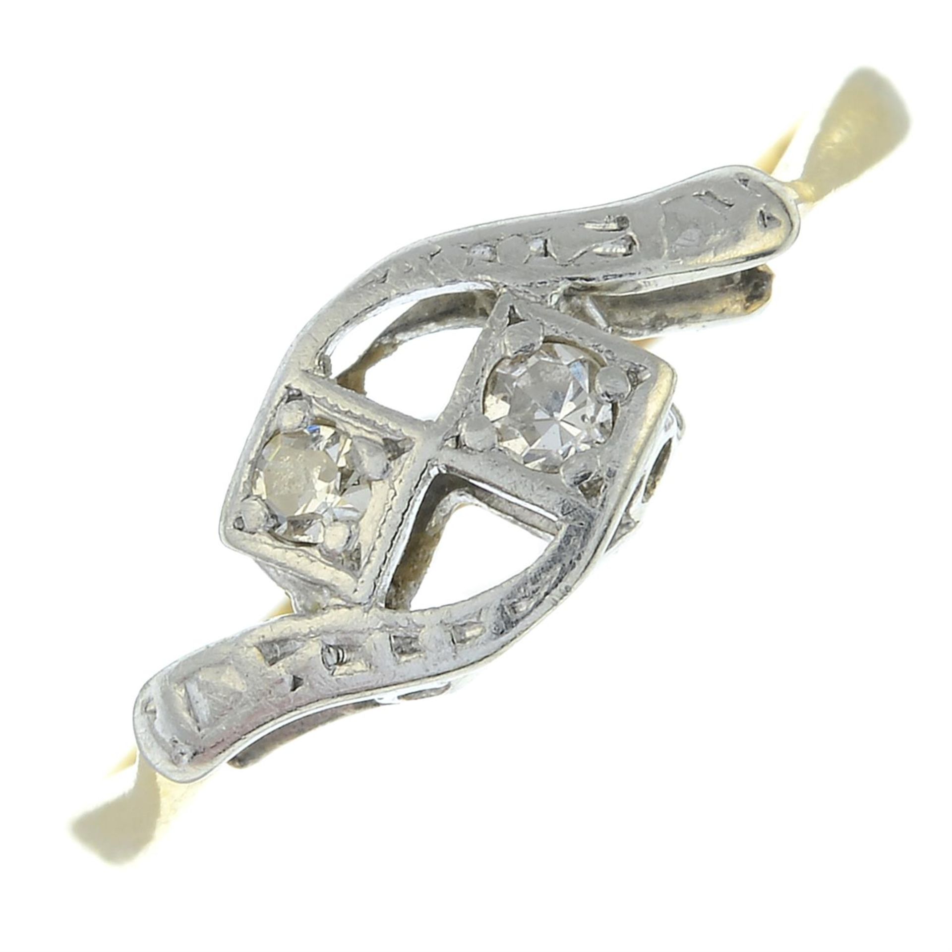 An early to mid 20th century 18ct gold old-cut diamond two-stone ring.