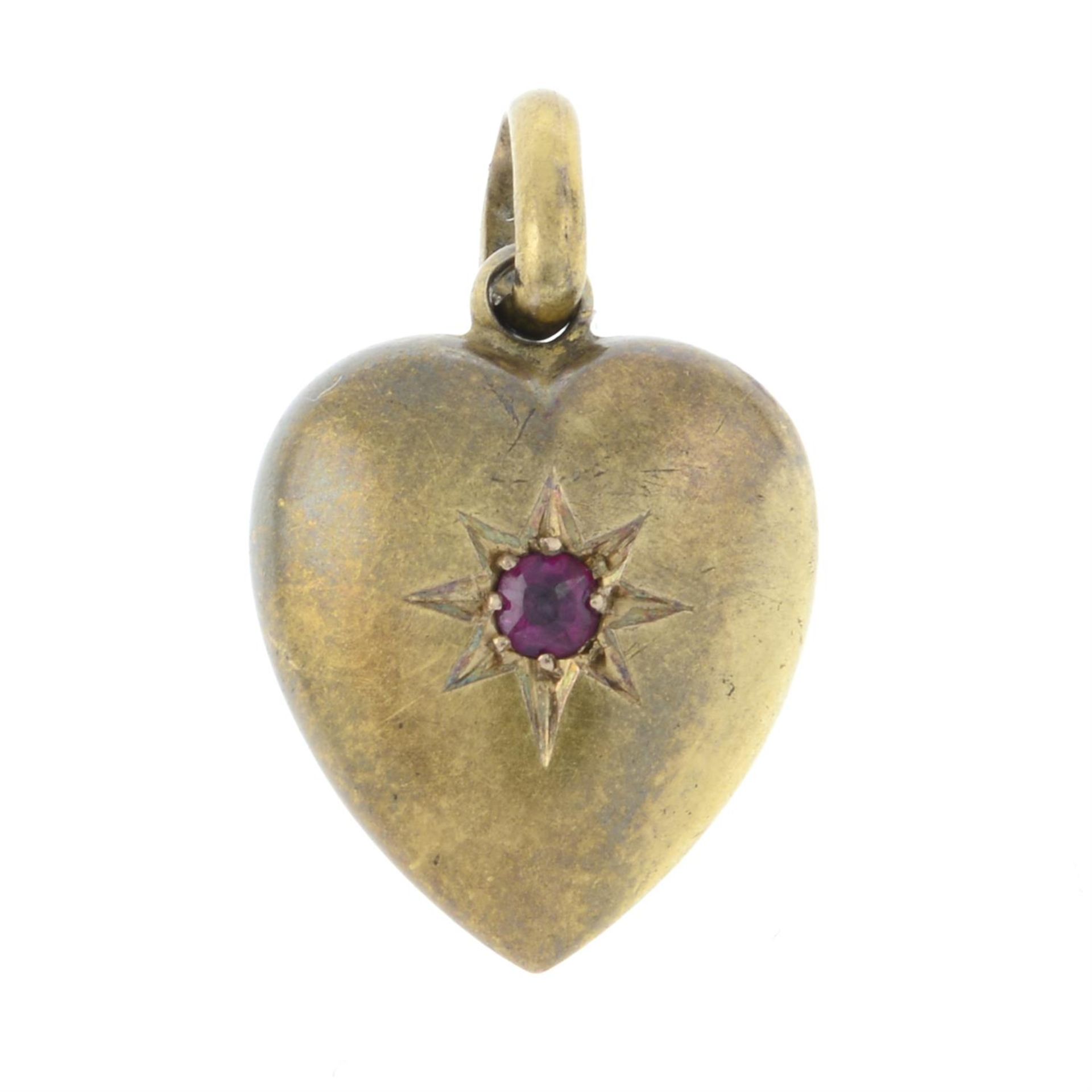 A late Victorian 15ct gold star-set ruby heart charm/pendant.