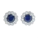 A pair of 18ct gold sapphire and diamond cluster stud earrings.