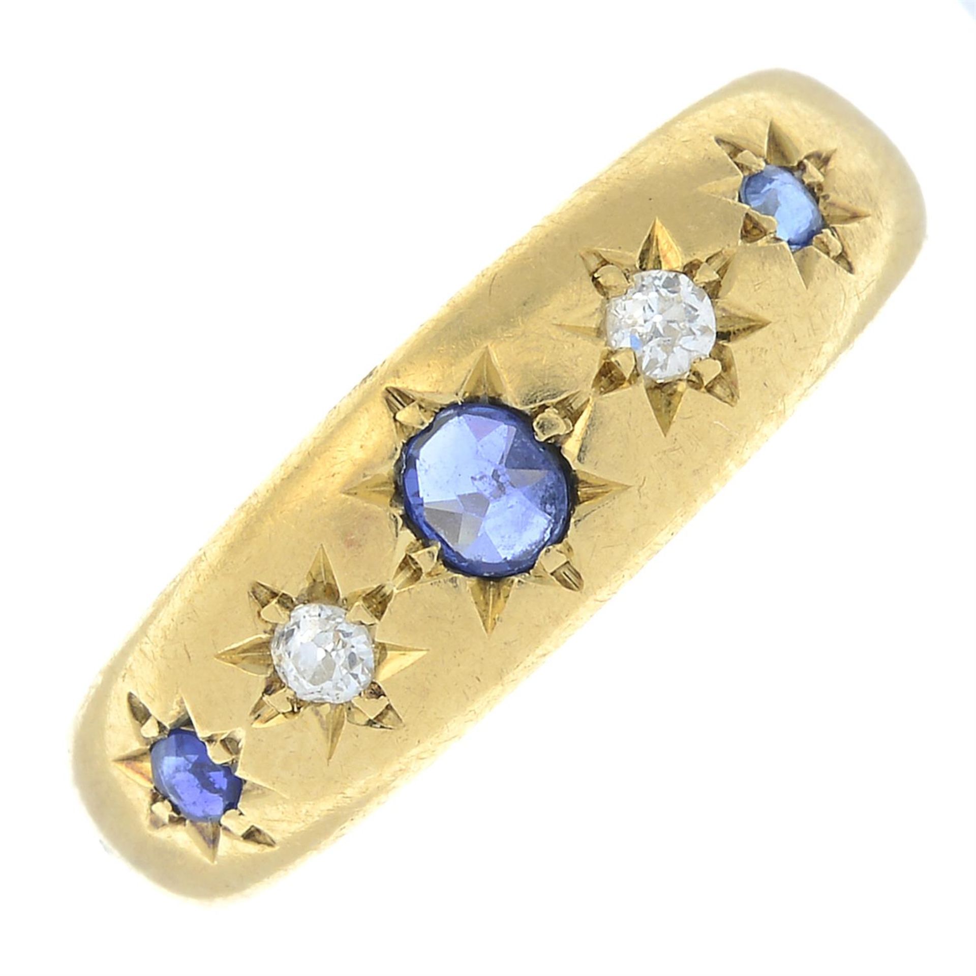 An Edwardian 18ct gold star-set sapphire and old-cut diamond band ring.