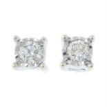 A pair of 9ct gold brilliant-cut diamond stud earrings.