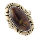 A fire agate single-stone dress ring.