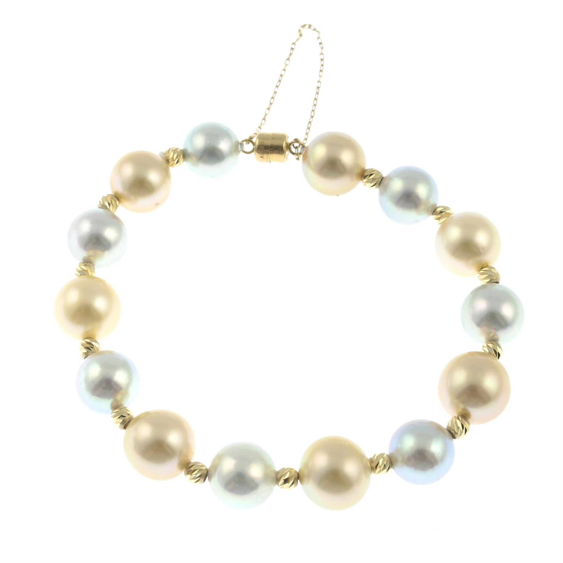 A vari-hue cultured pearl bracelet, with textured spacers.