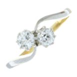 An 18ct gold old-cut diamond two-stone ring.