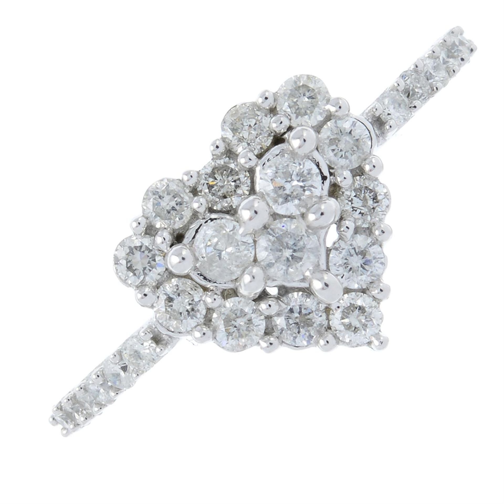 A brilliant-cut diamond heart-shape cluster ring.
