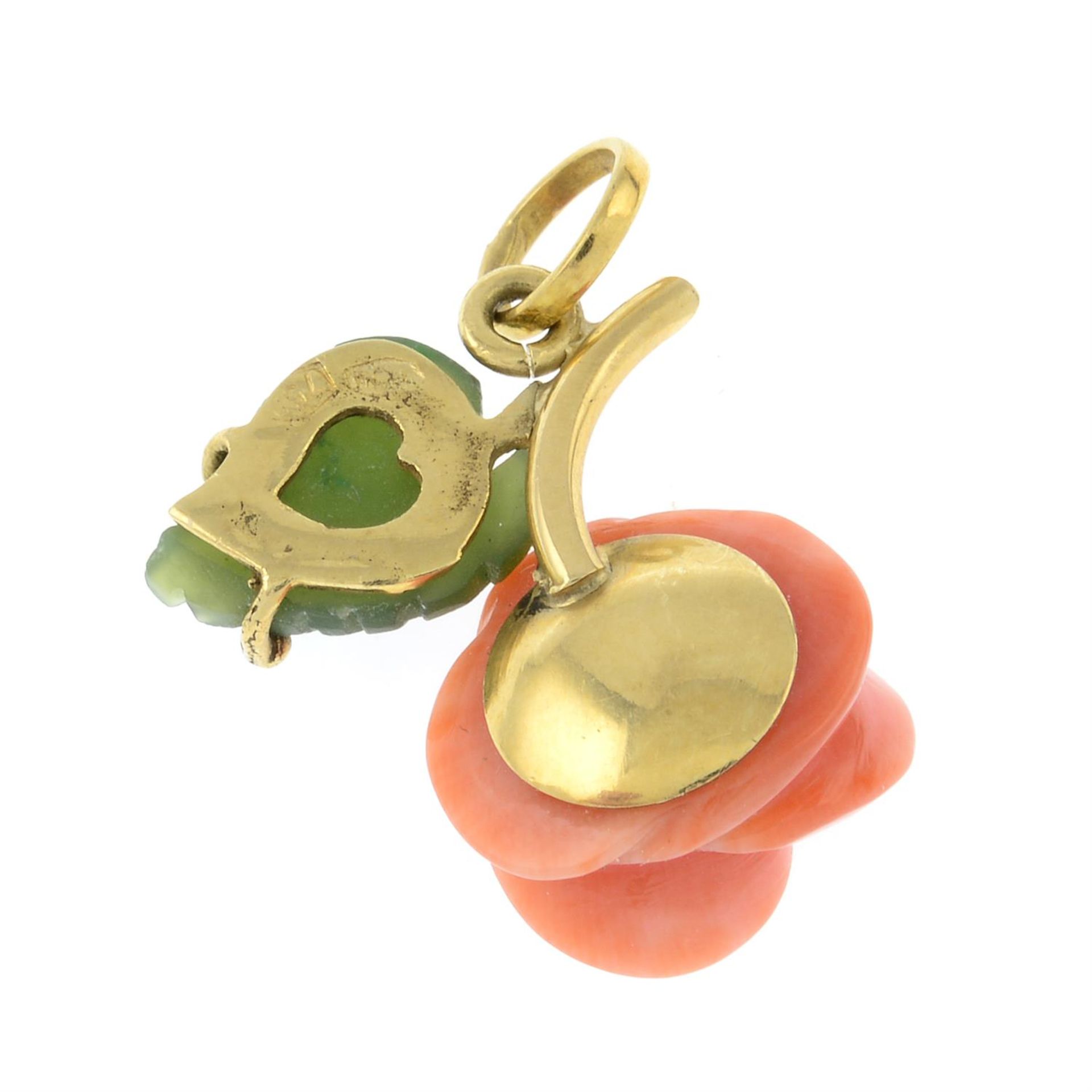 A carved coral and nephrite rose pendant. - Image 2 of 2