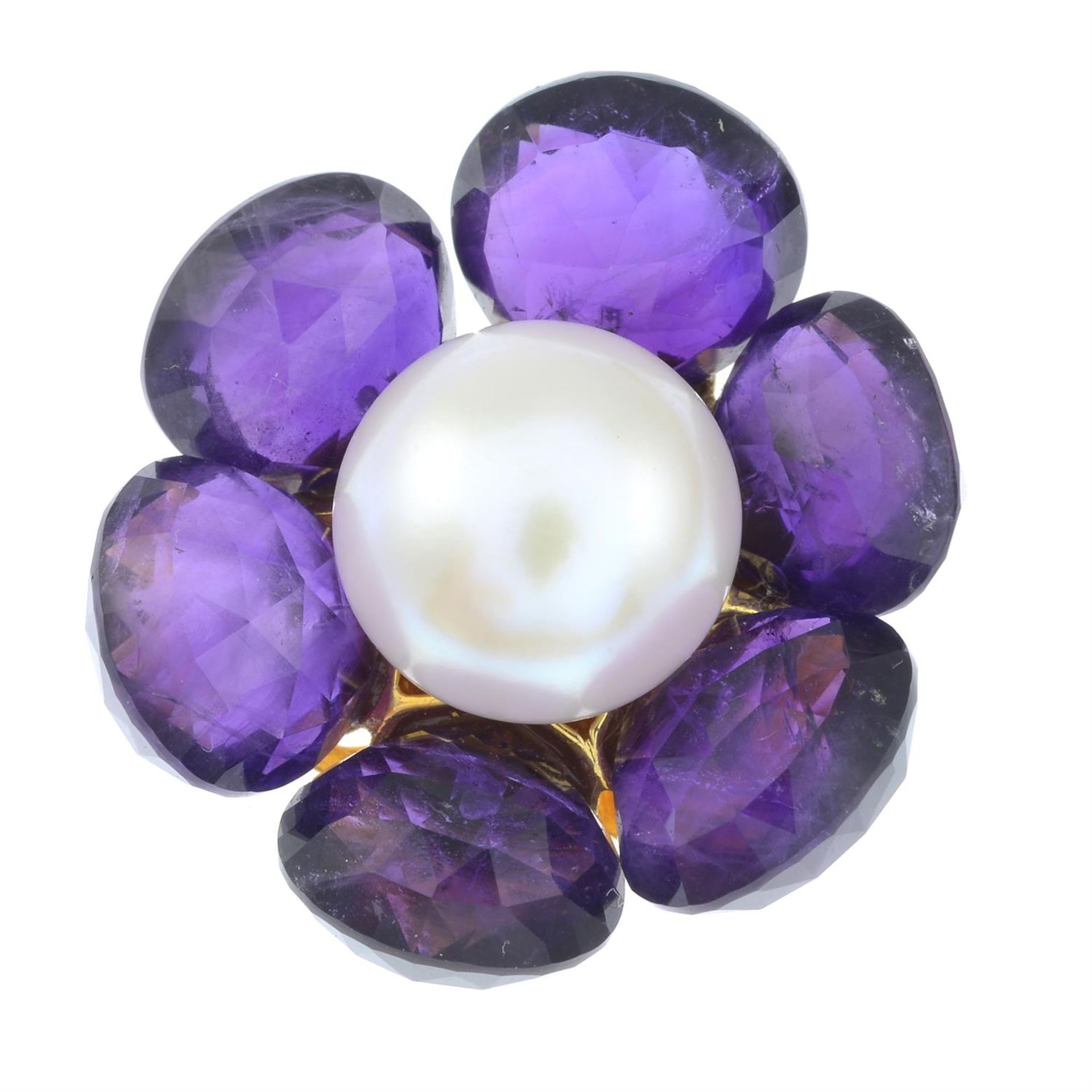 A cultured pearl and amethyst floral pendant.
