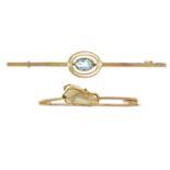 An early 20th century 9ct gold aquamarine and seed pearl bar brooch and an early 20th century 9ct