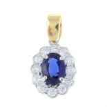 An 18ct gold sapphire and diamond cluster pendant.