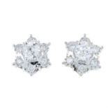 A pair of 18ct gold diamond cluster earrings.