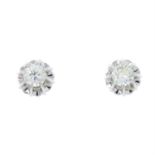 A pair of 18ct gold brilliant-cut diamond single-stone stud earrings.