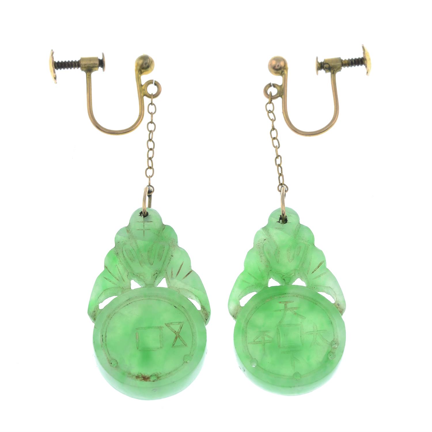 A pair of late 19th century 9ct gold carved jade drop earrings.