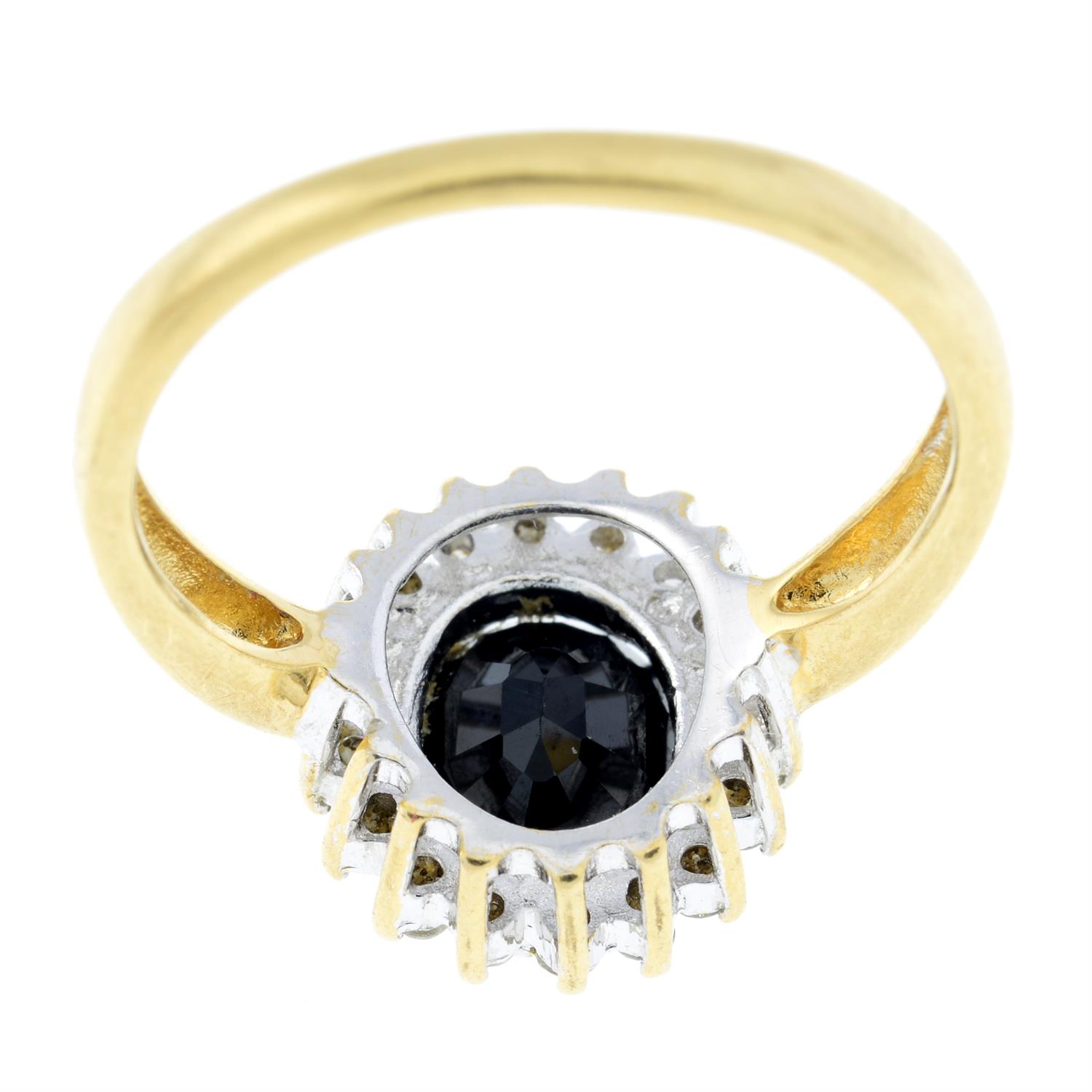 An 18ct gold sapphire and diamond cluster ring. - Image 2 of 2