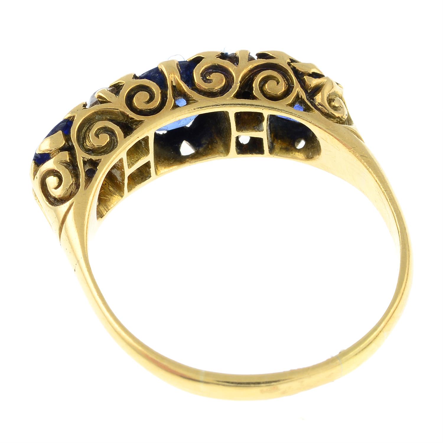 An early 20th century 18ct gold sapphire three-stone ring, with old-cut diamond spacers. - Image 2 of 2