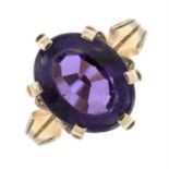 An oval-shape amethyst single-stone ring.