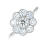A brilliant-cut diamond floral cluster ring.