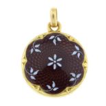 An early 20th century gold white and brown floral enamel locket.