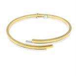 An 18ct gold bi-colour cuff bangle.