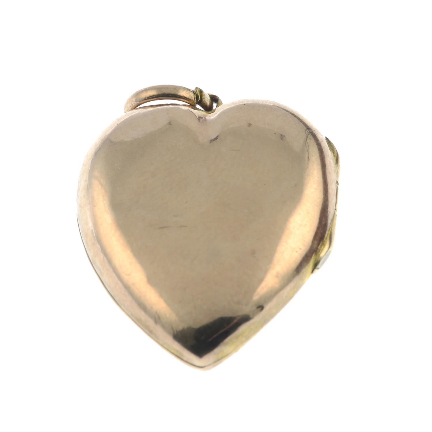 An early 20th century heart shape locket pendant, with split pearl and garnet topped doublet cross - Image 2 of 2