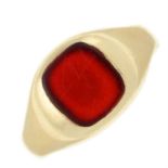 A 9ct gold carnelian signet ring.