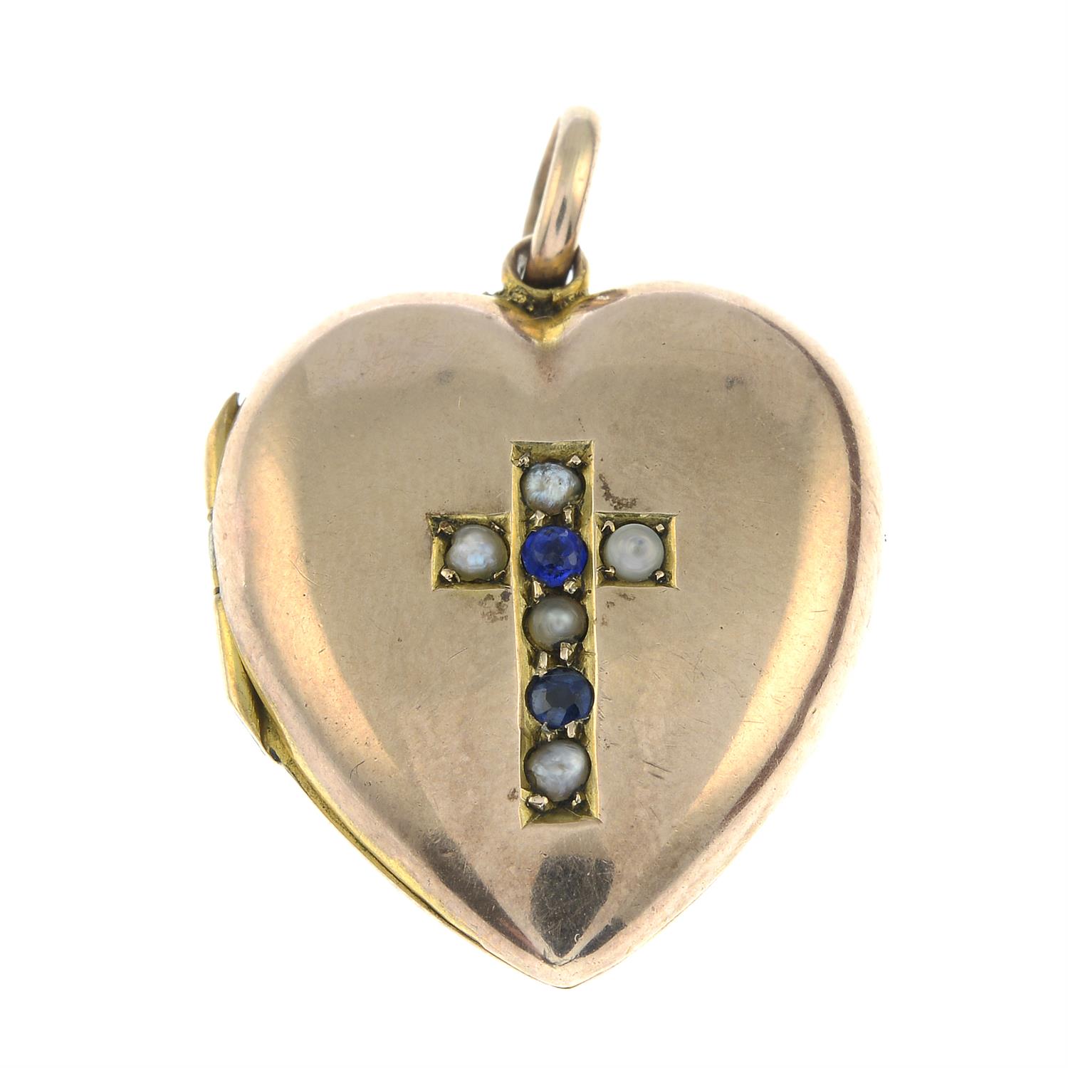 An early 20th century heart shape locket pendant, with split pearl and garnet topped doublet cross