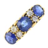 An early 20th century 18ct gold sapphire three-stone ring, with old-cut diamond spacers.