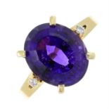 An amethyst dress ring, with diamond shoulders.