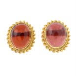 A pair of 9ct gold garnet cabochon earrings.