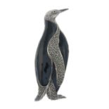 A mid 20th century onyx and marcasite penguin brooch.