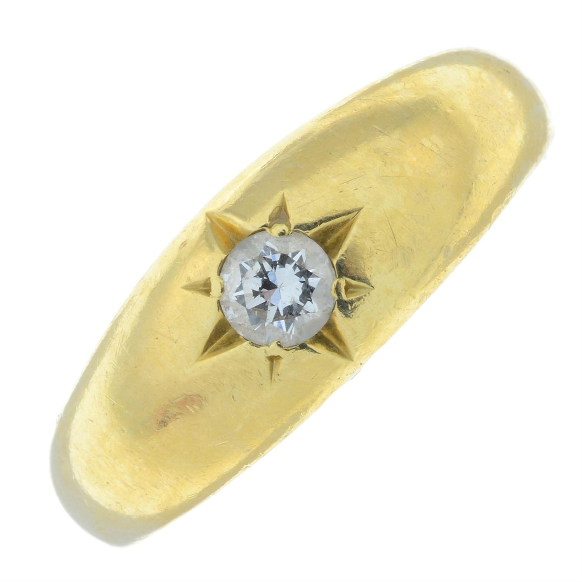 A star-set diamond band ring.